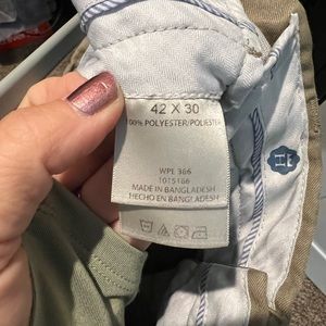 Haggar Mens Khaki dress pants, size 42 x 30.